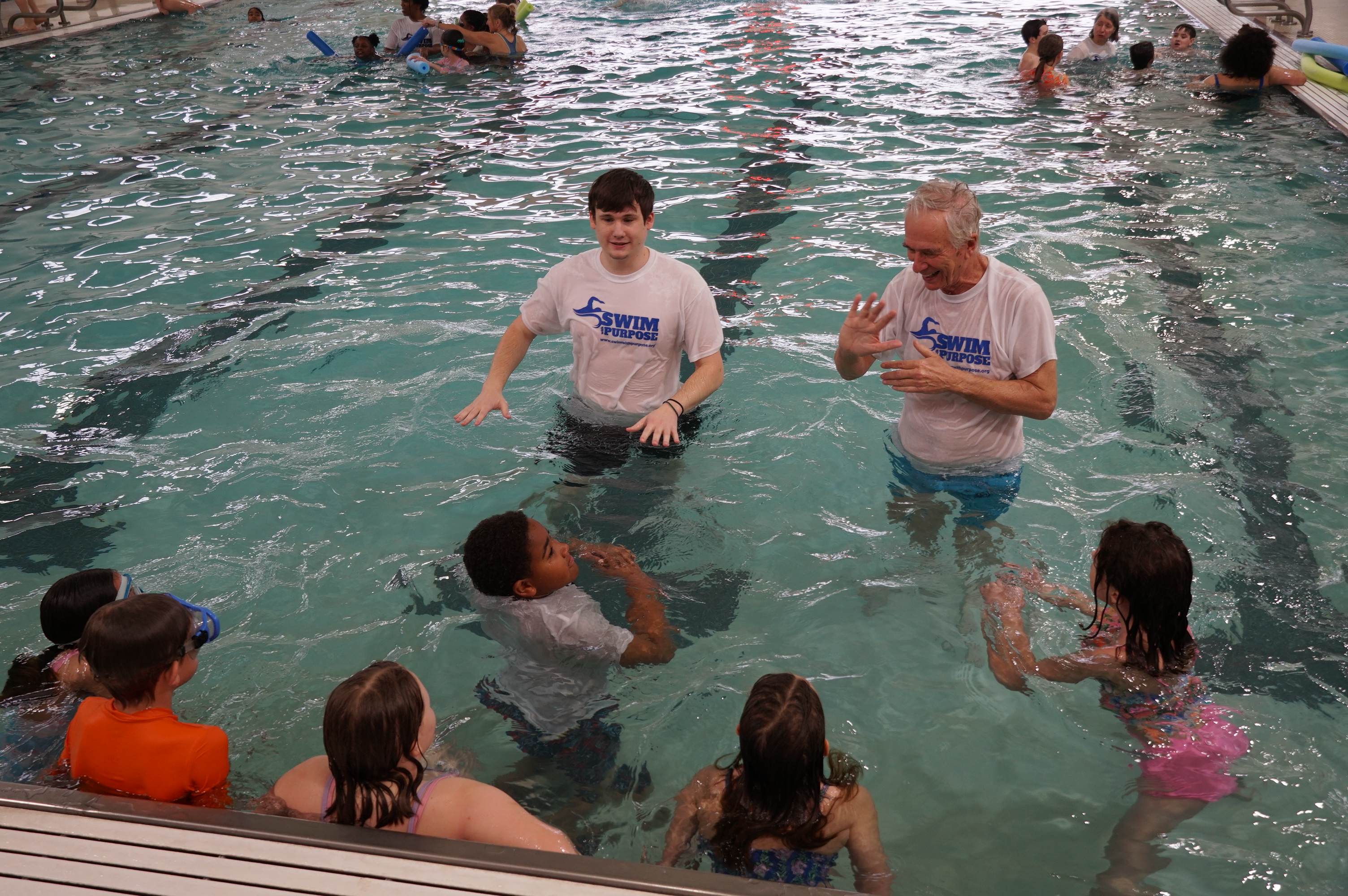 Children learning water safety skills
